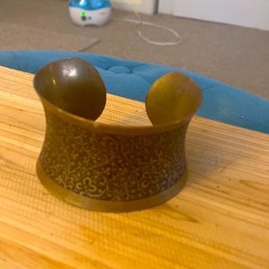 Distressed metal patterned cuff bracelet